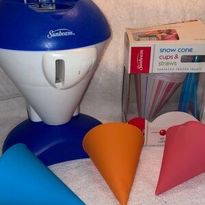 Sunbeam Snow Cone Maker with Blue, Orange, and Pink Accessories